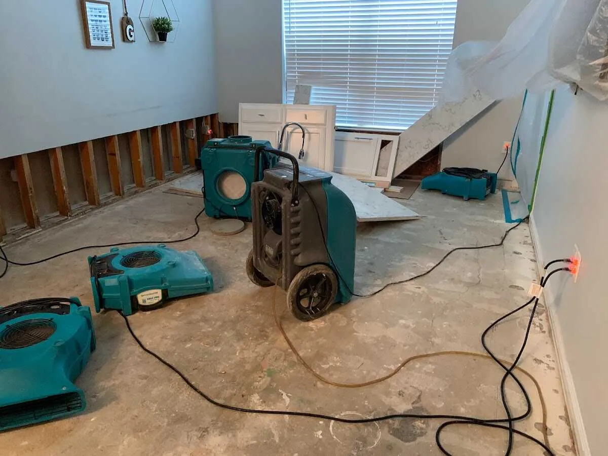 Dehumidifier in flood-cut room for Water Damage Restoration in Robinwood